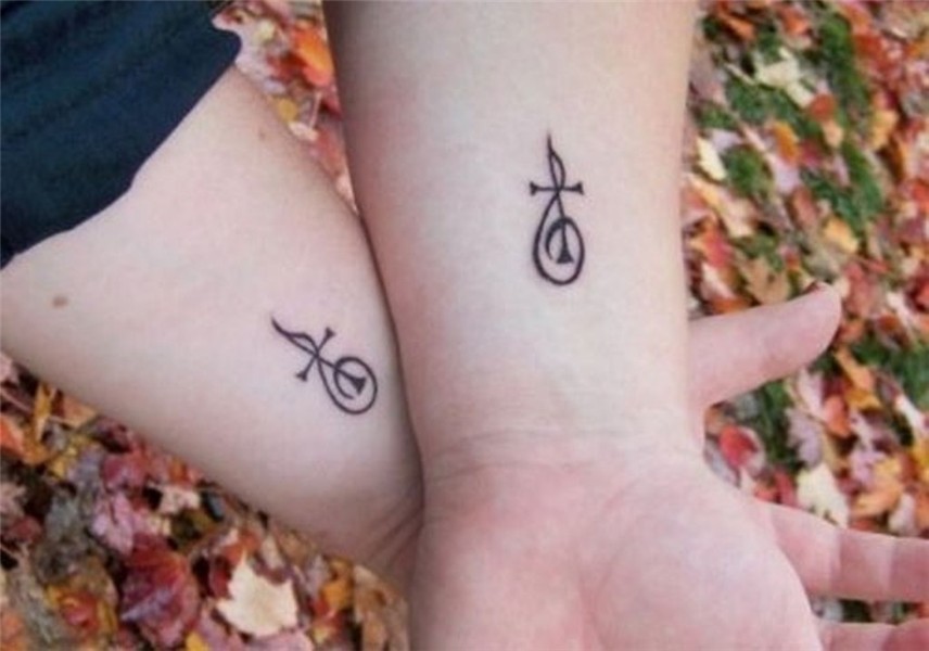 20 Awesome Symbol Wrist Tattoos Design