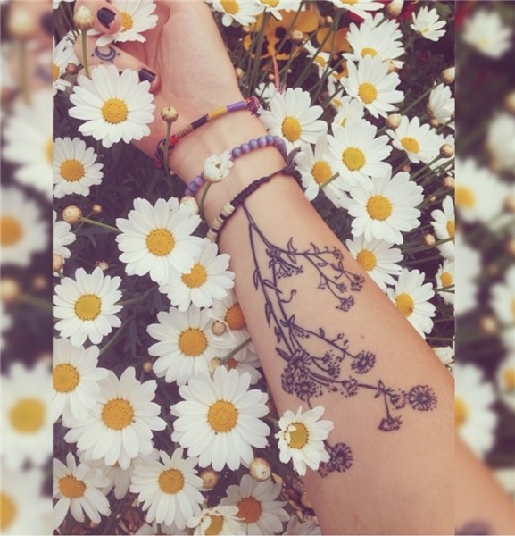 20 Pretty Tattoos That Channel an Inner Free Spirit Daisy ta