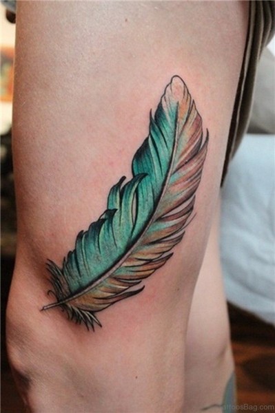 32 Graceful Feather Tattoos On Thigh