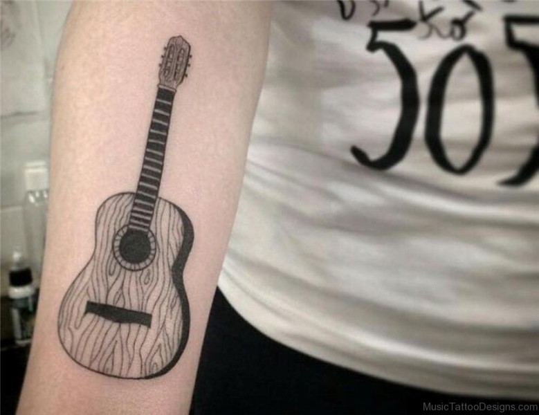 40 Elegant Guitar Tattoos For Wrist