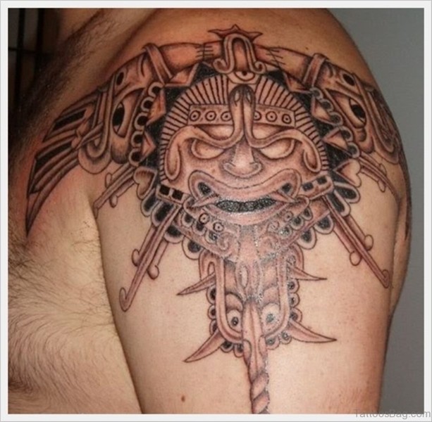 72 Outstanding Mask Tattoos On Shoulder