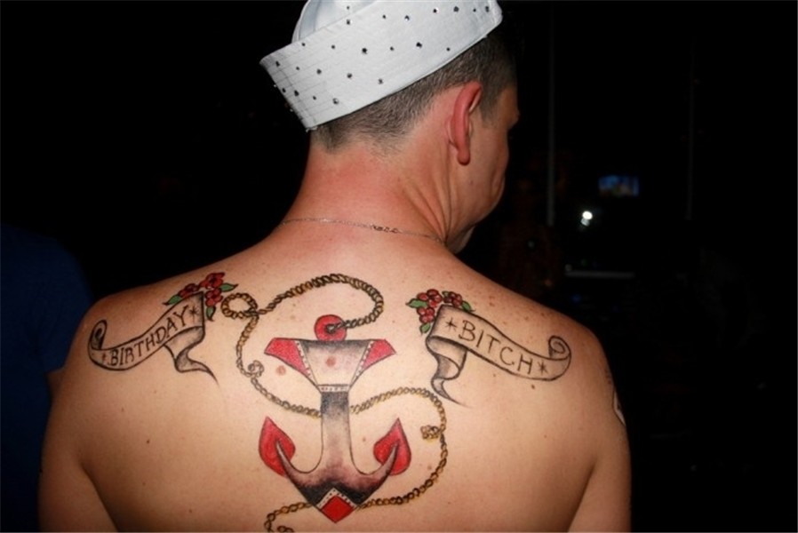 Anchor tattoo on neck