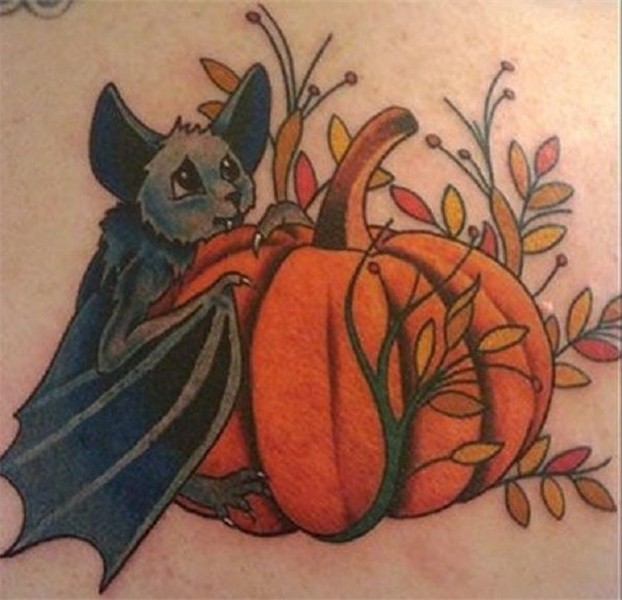 A really cute looking Halloween tattoo design. The bat in th