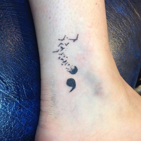 A semicolon #tattoo with the upper dot fading into birds. Th