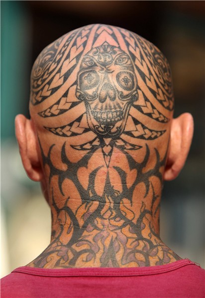Awesome Black Tribal Head Tattoo For Men