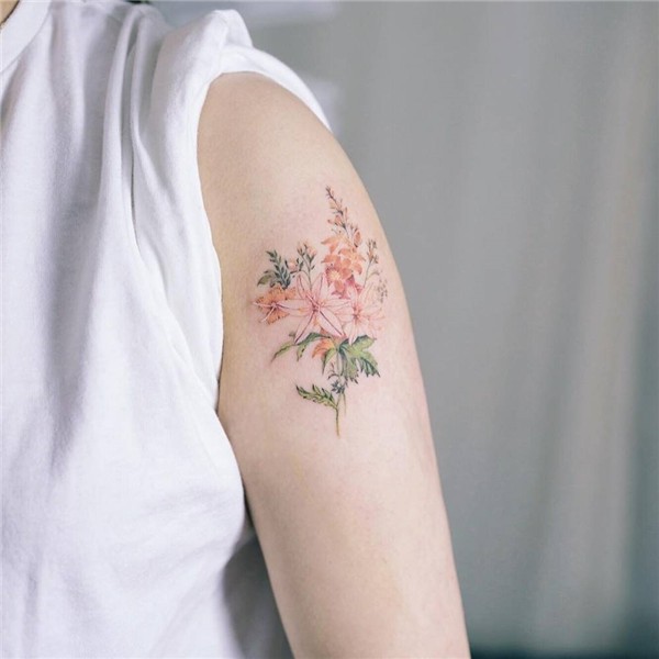 Beautiful and delicate flower on the left arm - Tattoogrid.n