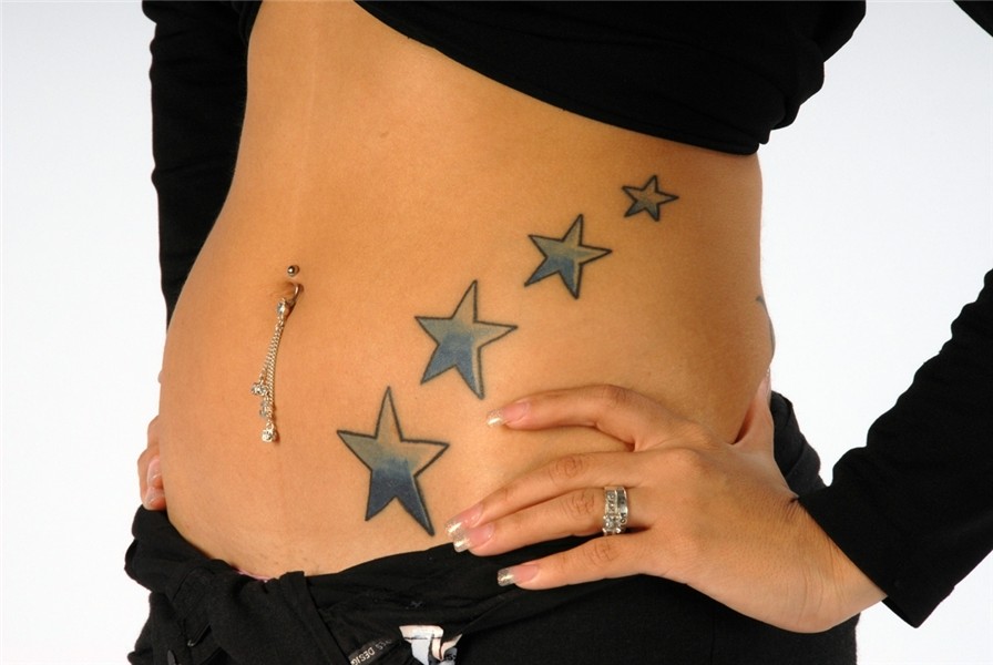 Blue Star Tattoos on Left Hip