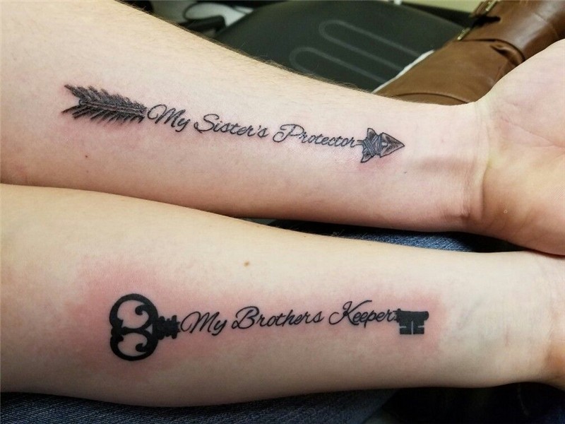 Brother and sister arrow and key tattoos on the forearm. Key