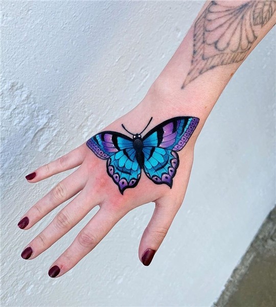 Butterfly Hand Tattoo