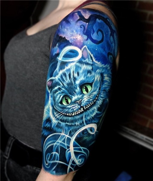 Cheshire Cat Arm Tattoo