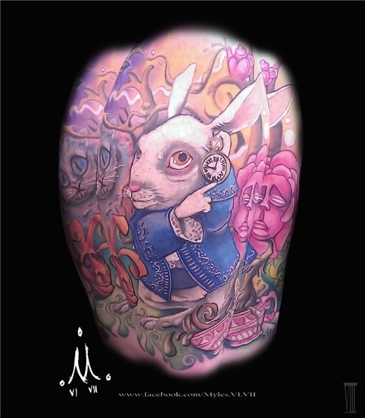 Colored Flowers And White Rabbit Tattoo