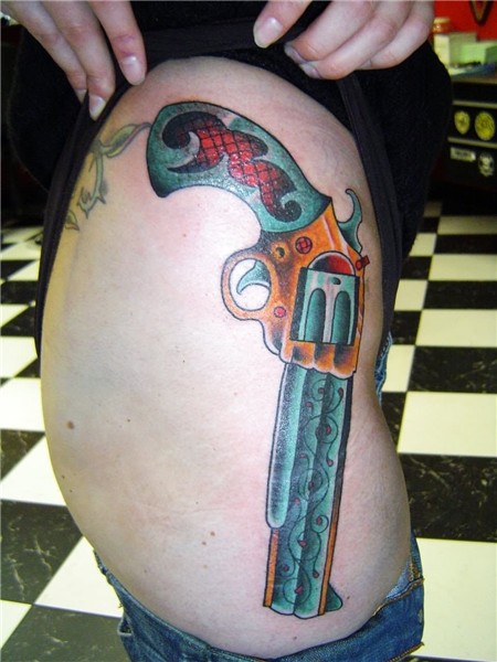 Colored Gun Tattoo On Right Side