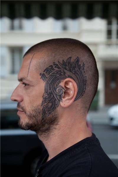 Ear Tattoo Images & Designs