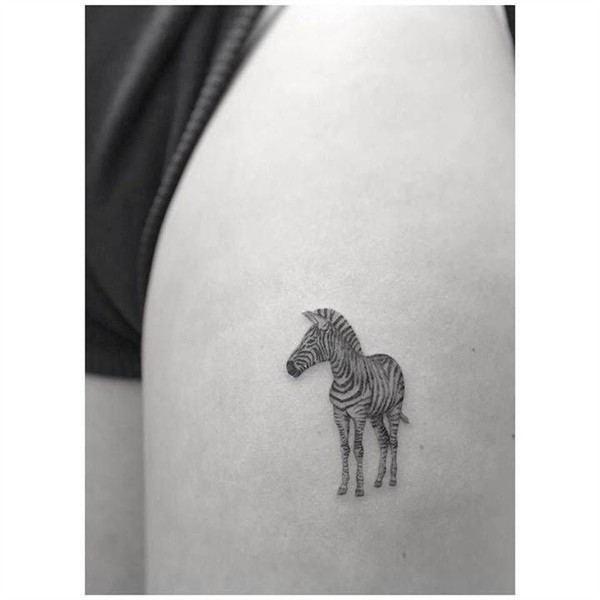 Fine line zebra tattoo on the left thigh. Zebra tattoos, Uni
