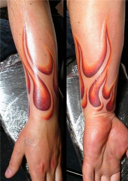 Fire Arm Tattoo Image Tattooing Tattoo Designs Flame tattoos