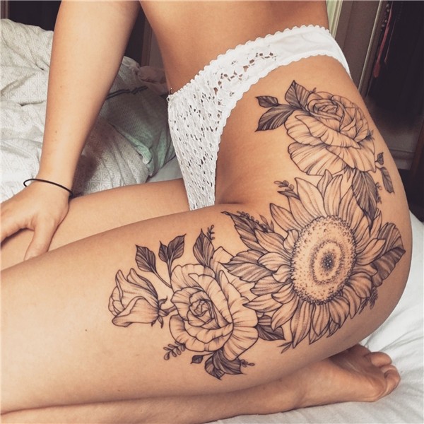 Floral thigh hip tattoo. Summer floral tattoo. Sunflower tat