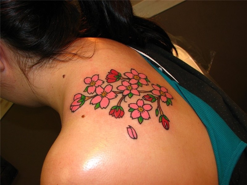 Flowers tattoo on back of shoulder