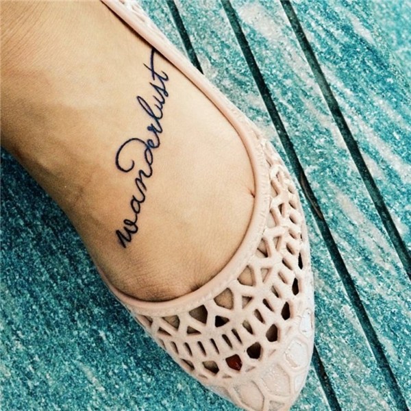 Foot tattoo saying 'Wanderlust' on Itskymliza.