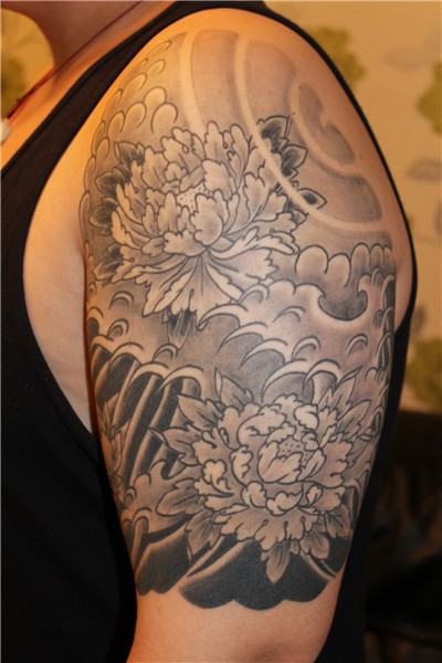 ▷ Forearm Japanese Clouds Tattoo