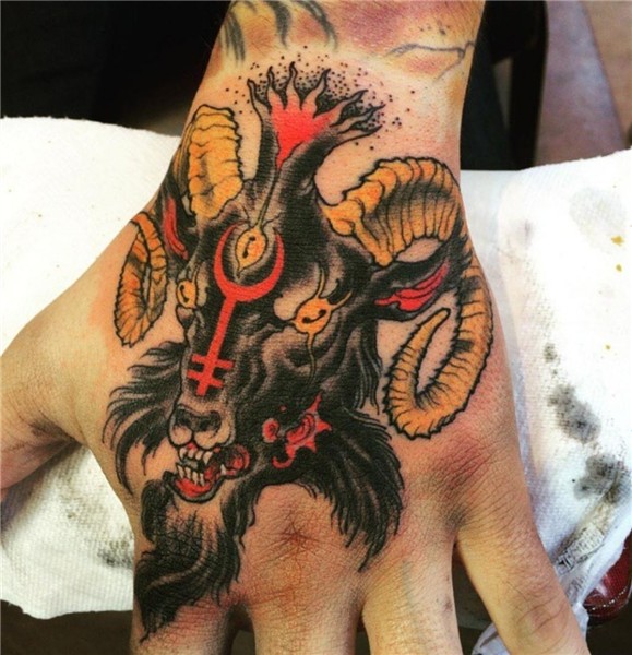 Goat Head On Hand Tattoo Tattoo goat, Satanic tattoos, Head