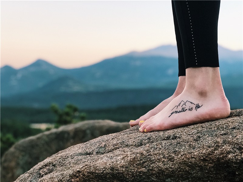 Greater is He, John 4:10, mountain, tattoo, foot tattoo. Foo