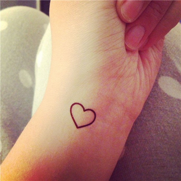 Heart tattoo on wrist Heart tattoo wrist, Simple heart tatto