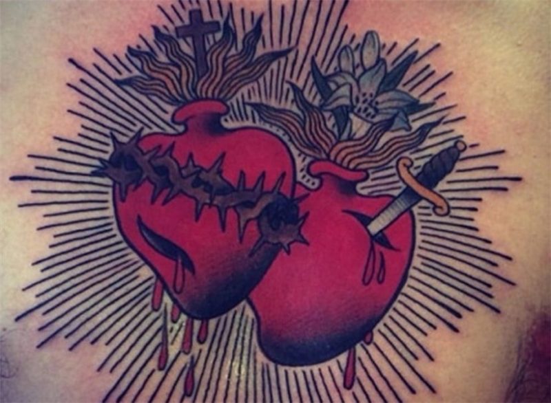 Heart tattoos with thorns Tattooing