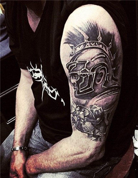 Impressive black and white big shoulder tattoo of antic warr