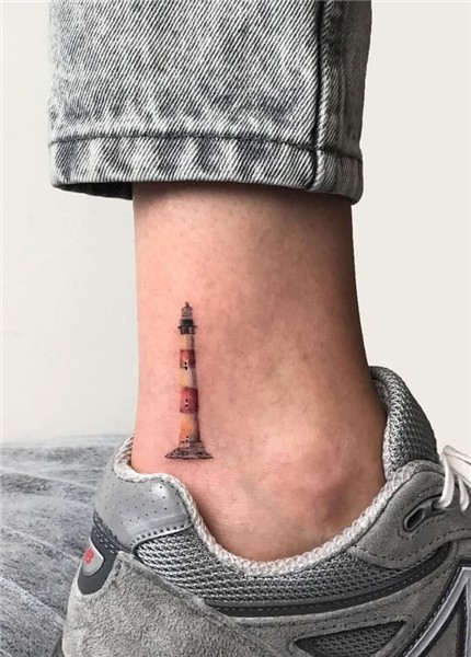 Lighthouse Tattoo - InkStyleMag Light tattoo, Lighthouse tat