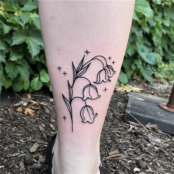 Lily of the valley tattoo inked on the left calf Neck tattoo