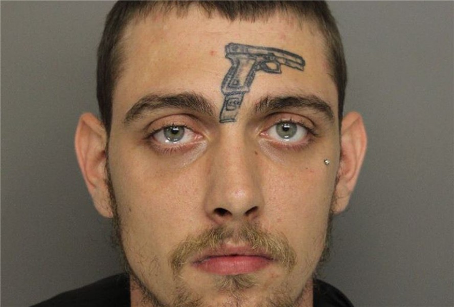Michael Vines: Man With Gun Tattoo On Face Busted For Illega