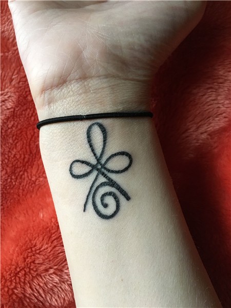 My newest ink!! It's the Celtic symbol for Strength. I did j
