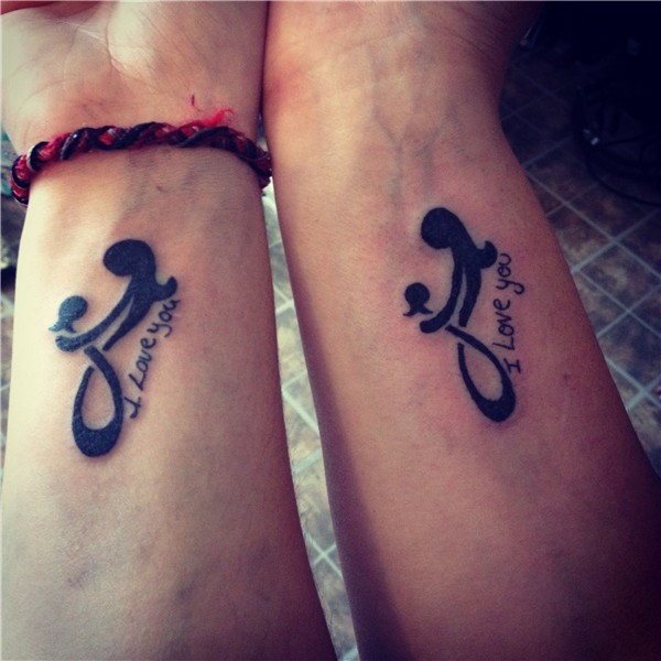 My tattoo with my mom. My handwriting on hers and hers on mi
