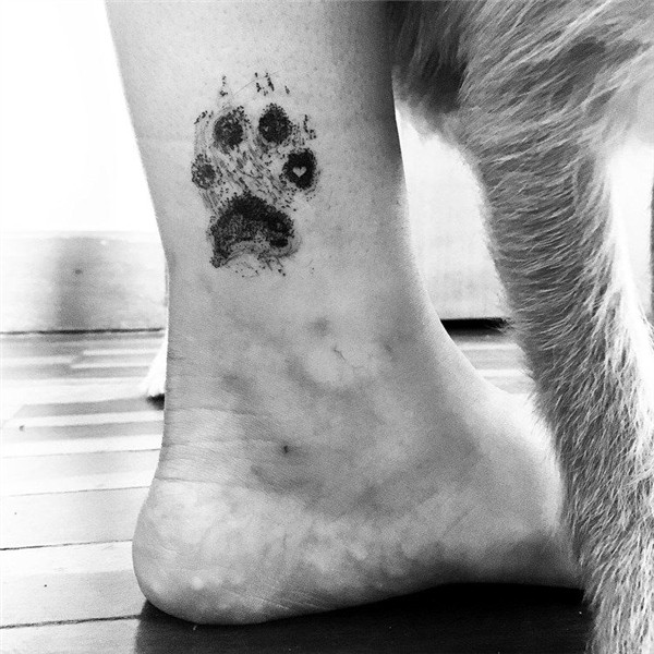New Trend: Pet Owners Are Getting Tattoos of Their Dogs' Paw