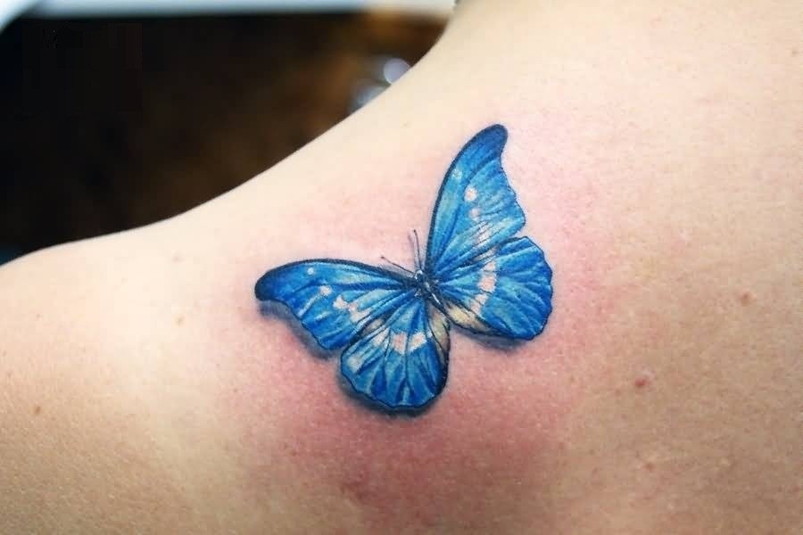 Old Blue Butterfly Tattoo Design On Back Shoulder