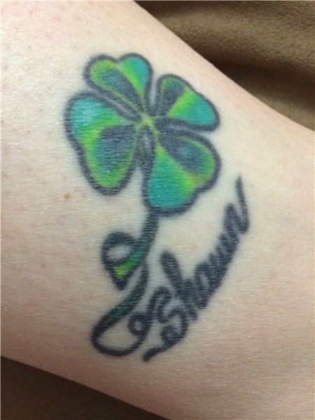 On my ankle- Irish/Celtic shamrock tattoo with name...cursiv