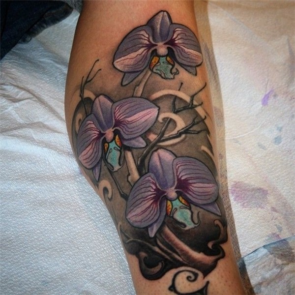 Orchid flower tattoo on calf Jeff Norton. Atascadero, CA www