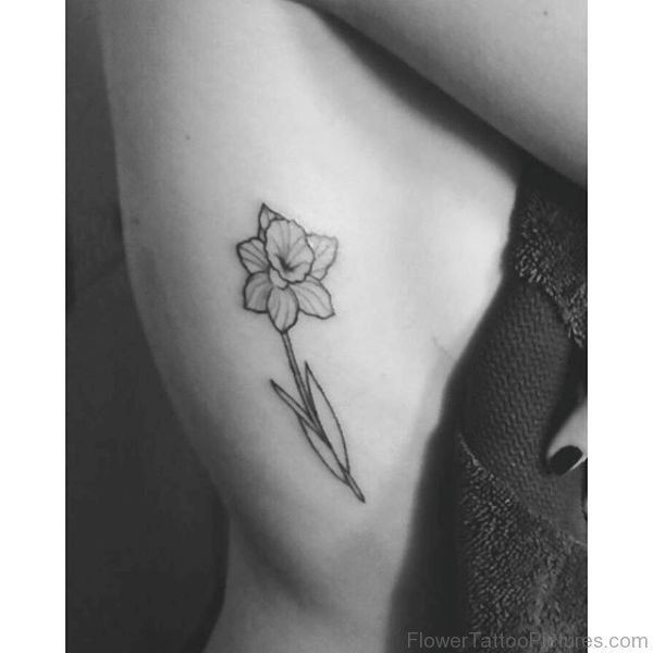 Pin by Baylee Rezac on ink Daffodil tattoo, Tattoos, Rib tat