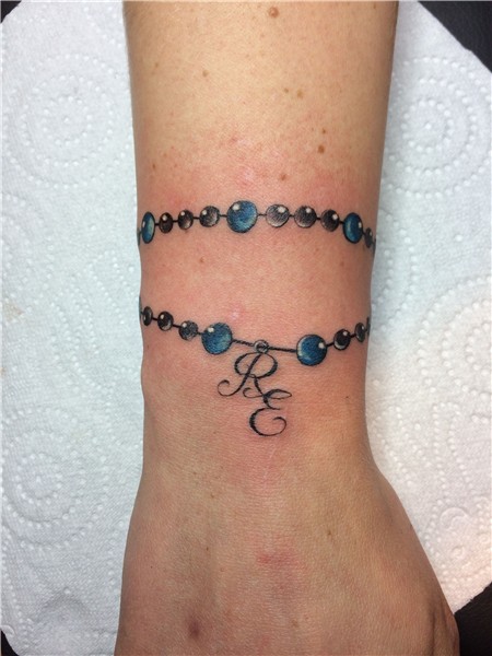 Pin by Esther Velez on Tattoo Wrist bracelet tattoo, Wrist t