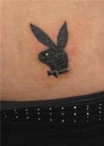 Playboy Tattoo Behind Ear