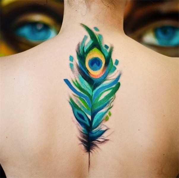 Pretty peacock feather tattoo by Magdalena Peacock feather t