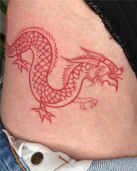 Red dragon tattoo on the right hip by Loz Thomas Red dragon
