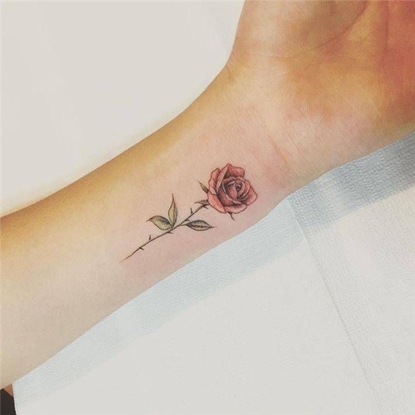 Red rose tattoo on the inner wrist. Small rose tattoo, Rose