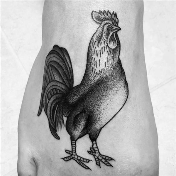 Rooster tattoo on the right foot.