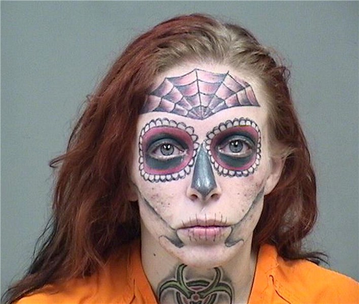 Shoplifter's mugshot shows off full-face SKULL tattoo as tra