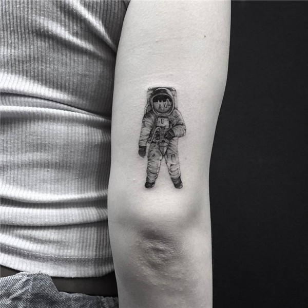 Single Needle Astronaut Arm Tattoo - Amazing Tattoo Ideas