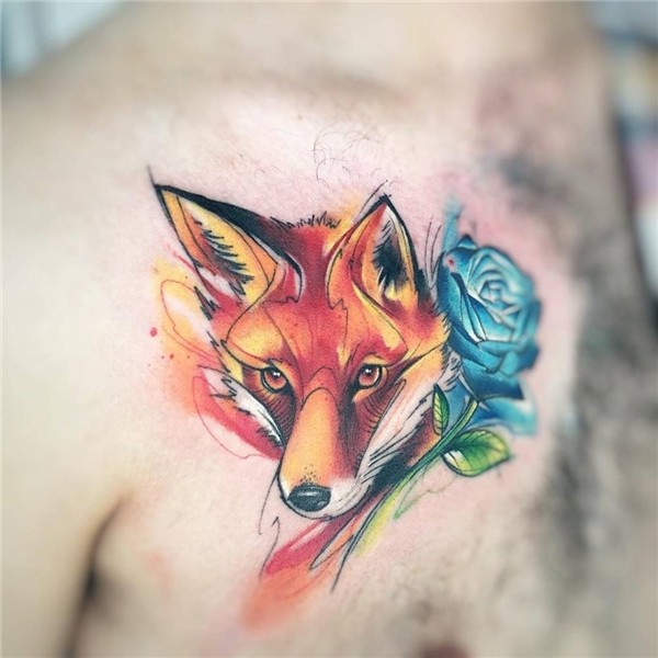 Sketch work fox and blue rose tattoo on the chest.