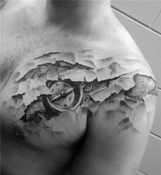 Skin tear & compass travel tattoo by Karl van der Linden. Ri