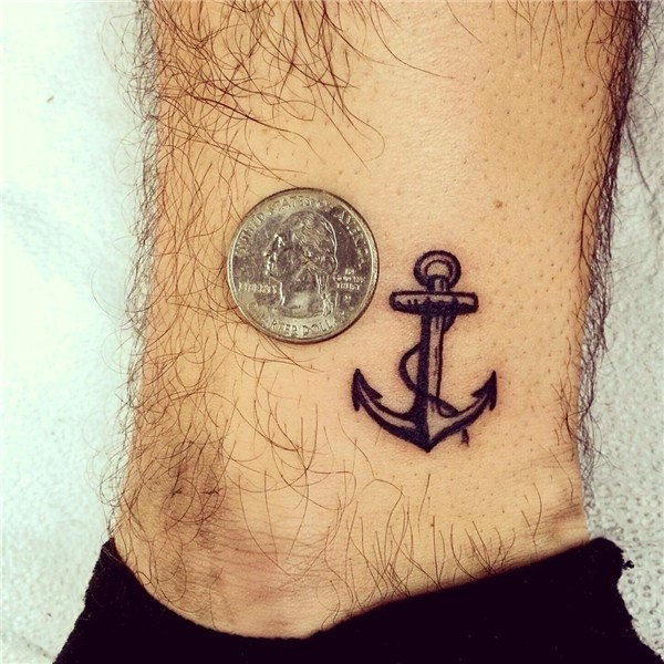 Small silhouette anchor tattoo on the inside of my right ank