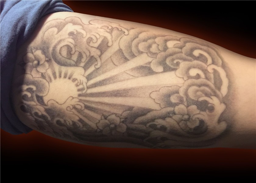 Sun tattoo japanese wave cloud black and grey bicep tattoo C